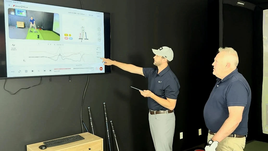 Golf performance analysis in the Wampler Golf Performance simulator bay.